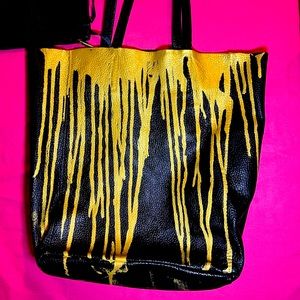 Leather hobo bag in black with gold drippy painting